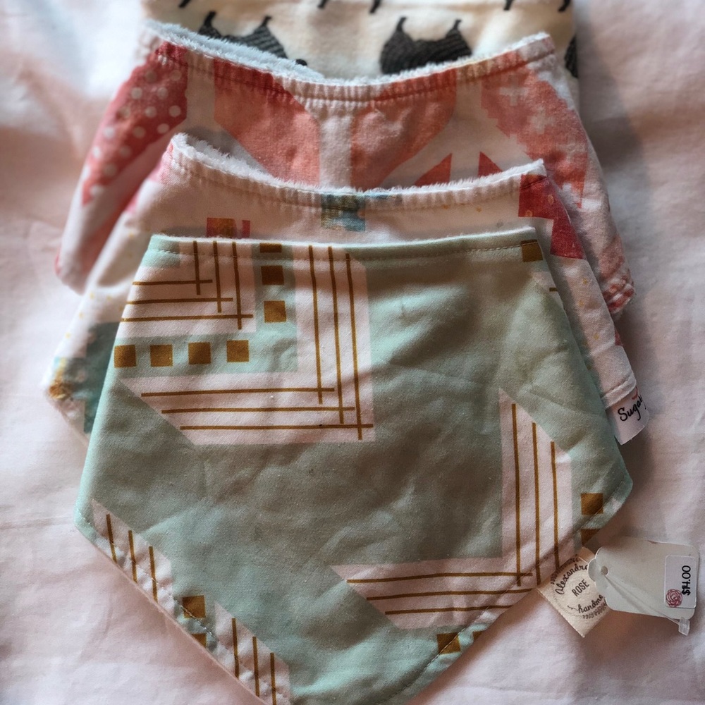 Pack of bibs, multiple brands, one new with tags